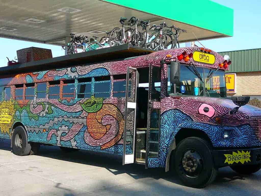 BRAG Bus gassing up on the way to party and ride bikes at RAGBRAI in Iowa